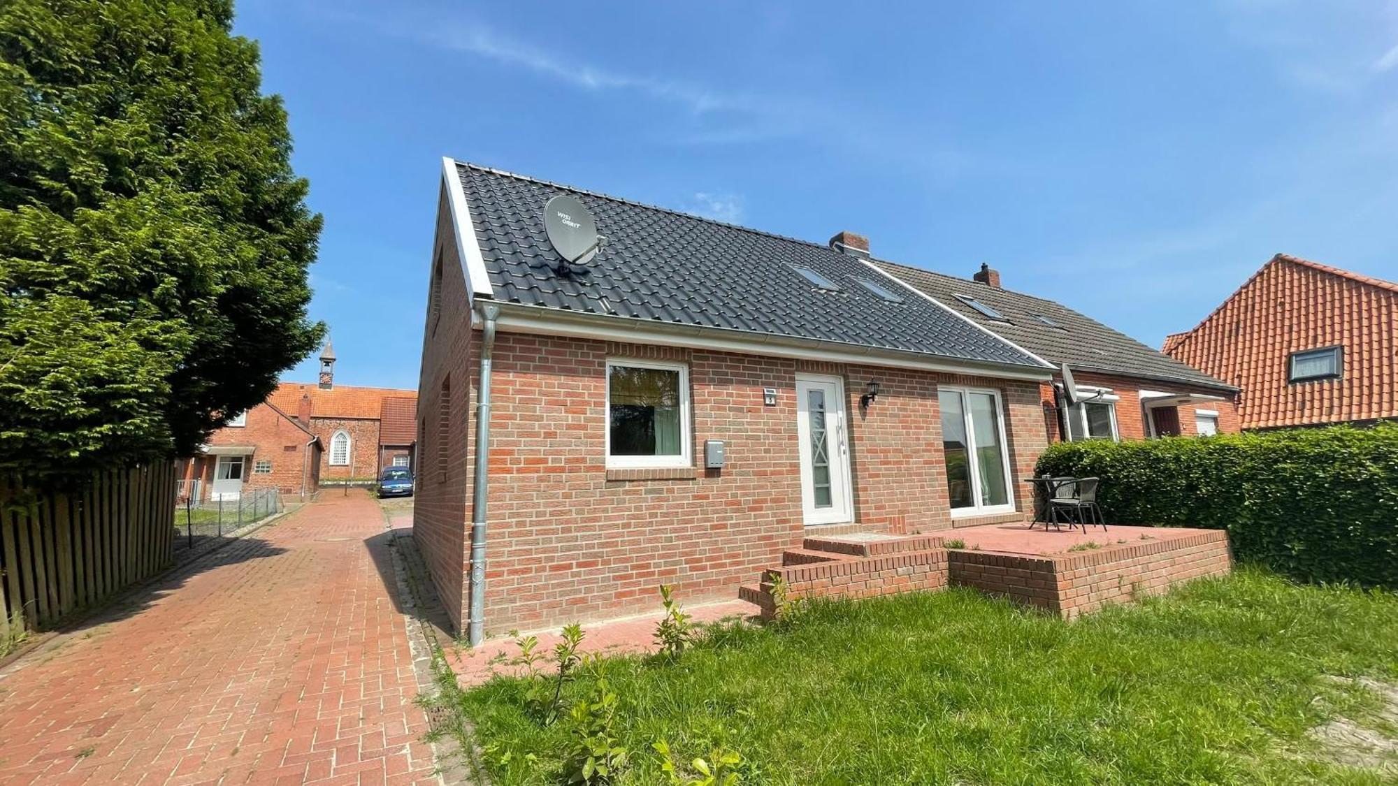Haus Kirchwarfenweg Vila Wirdum Exterior foto